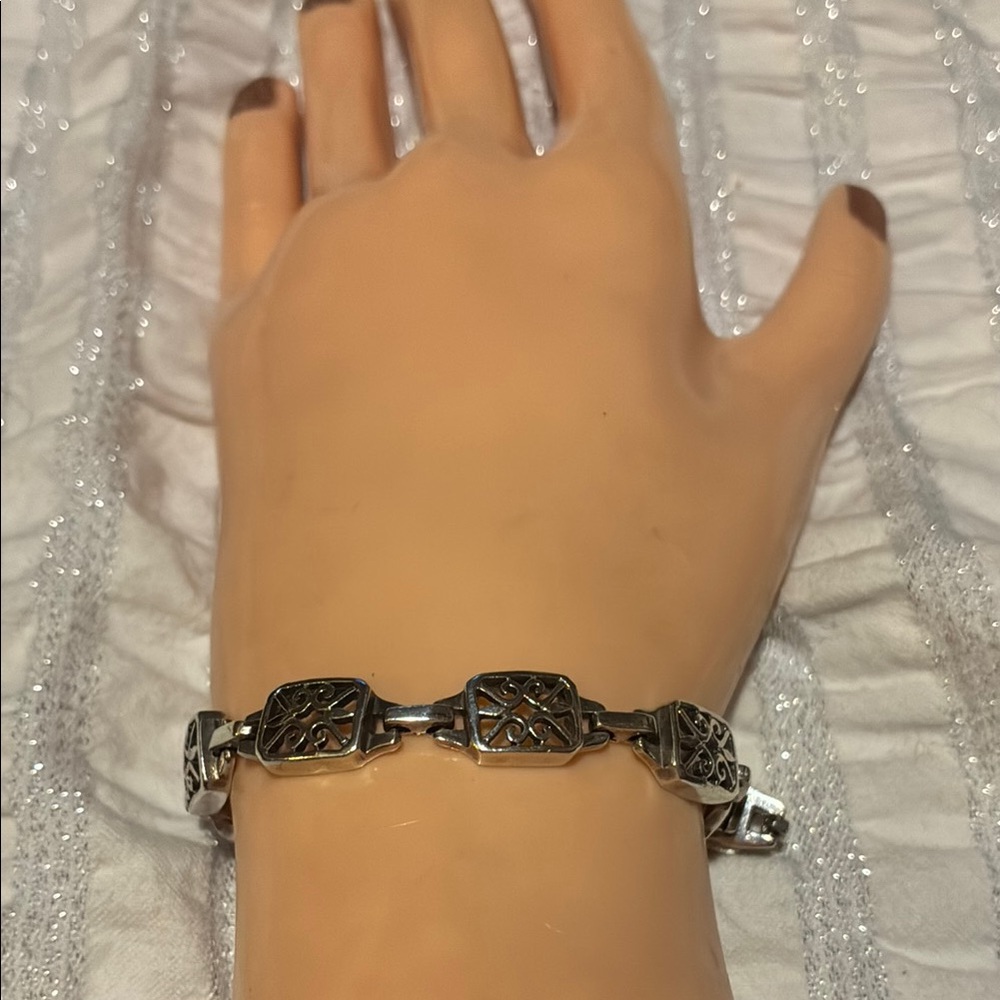 Elegant Sterling Silver Bracelet with Intricate Design marked 925